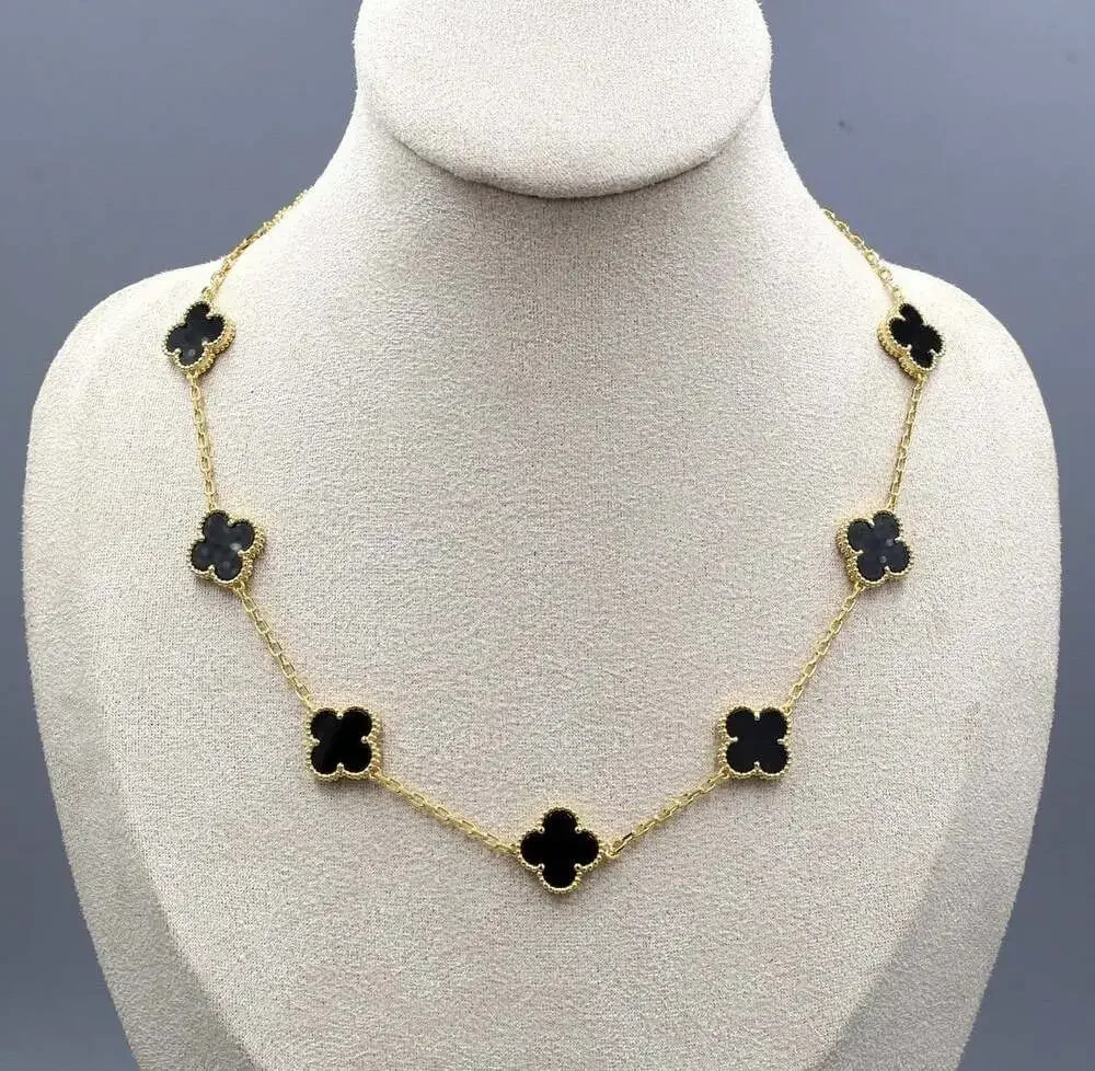 10 clover necklace black and gold
